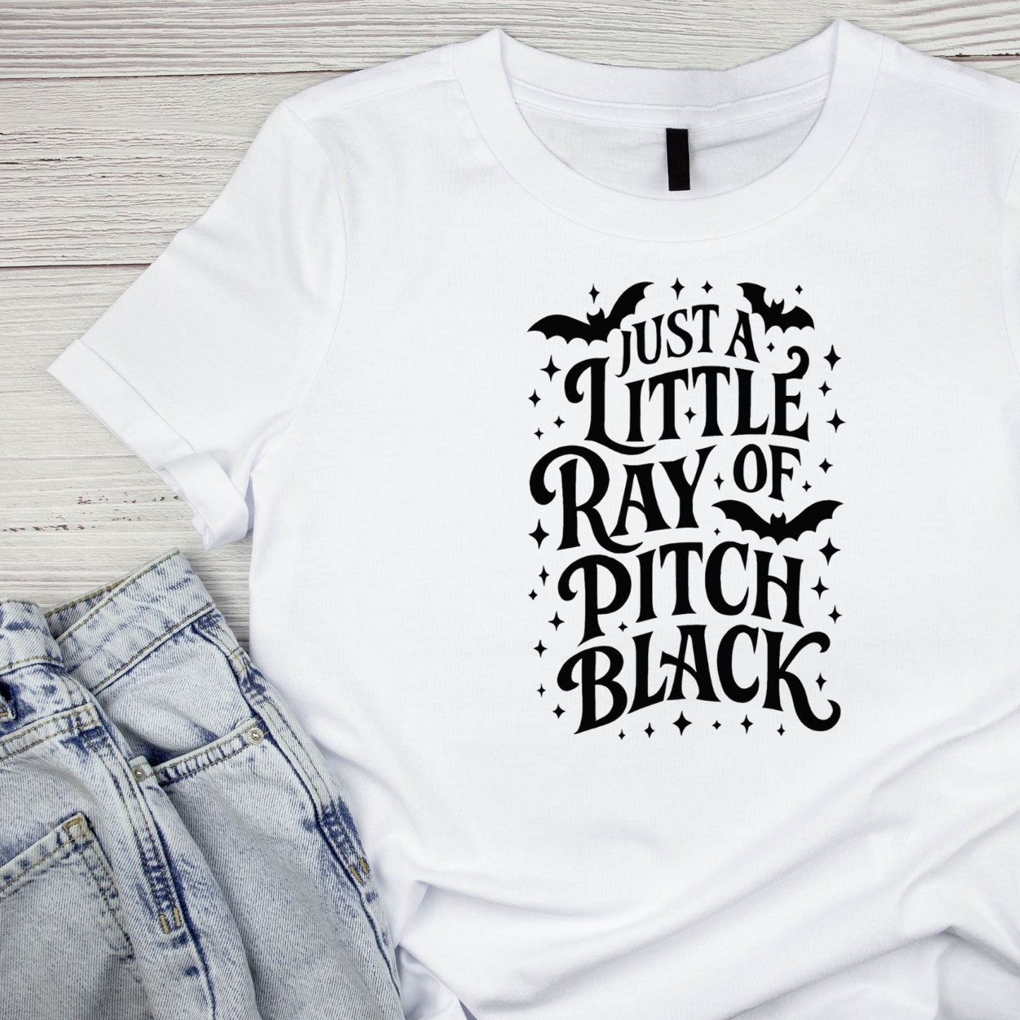 JUST A LITTLE RAY OF PITCH BLACK T-SHIRT