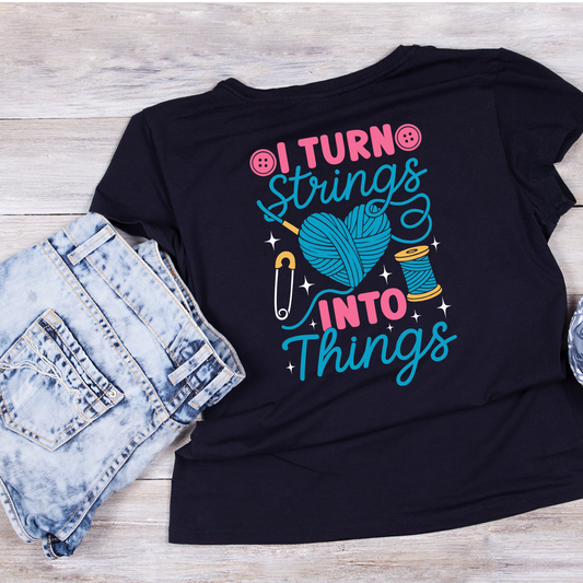 I Turn Strings Into Things T-Shirt | Funny Saying Graphic Tee | Yarn Balls Printed Shirt